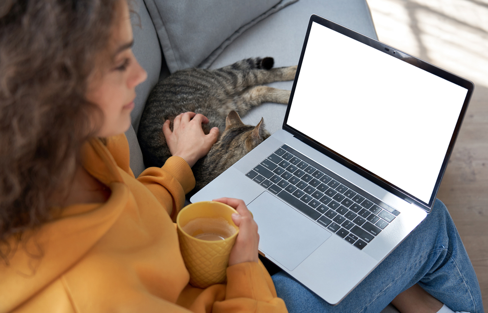 Photo of A Woman Using Laptop
