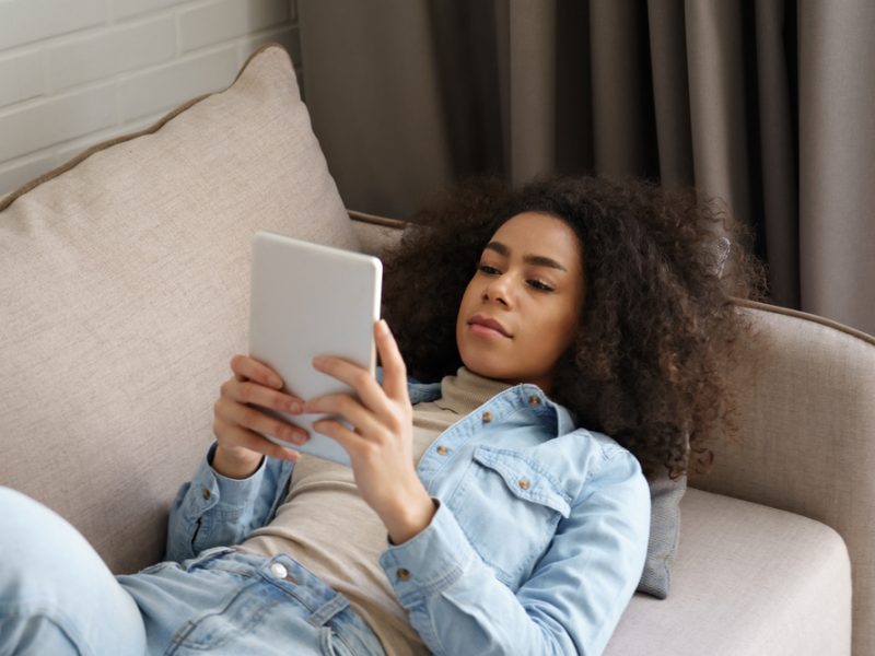Photo of Woman Using Tablet