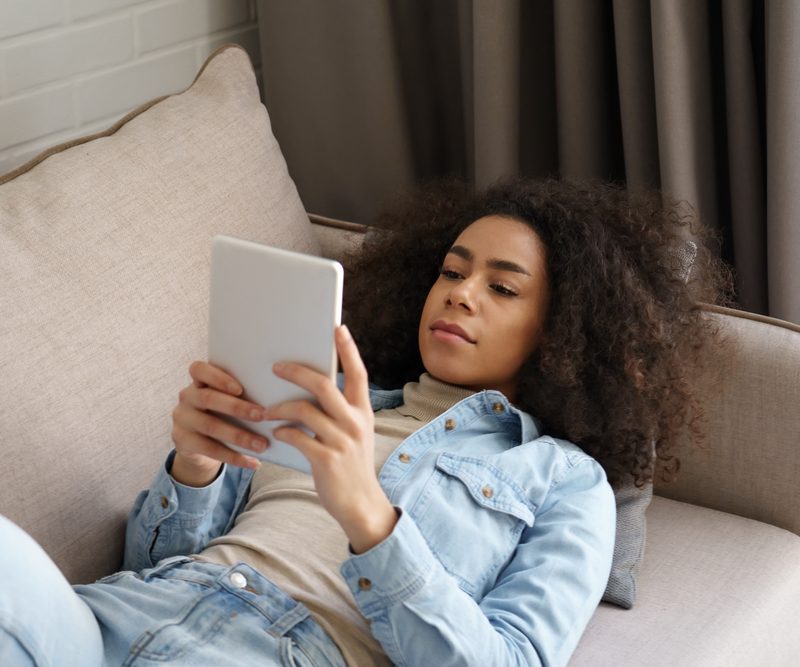 Photo of Woman Using Tablet